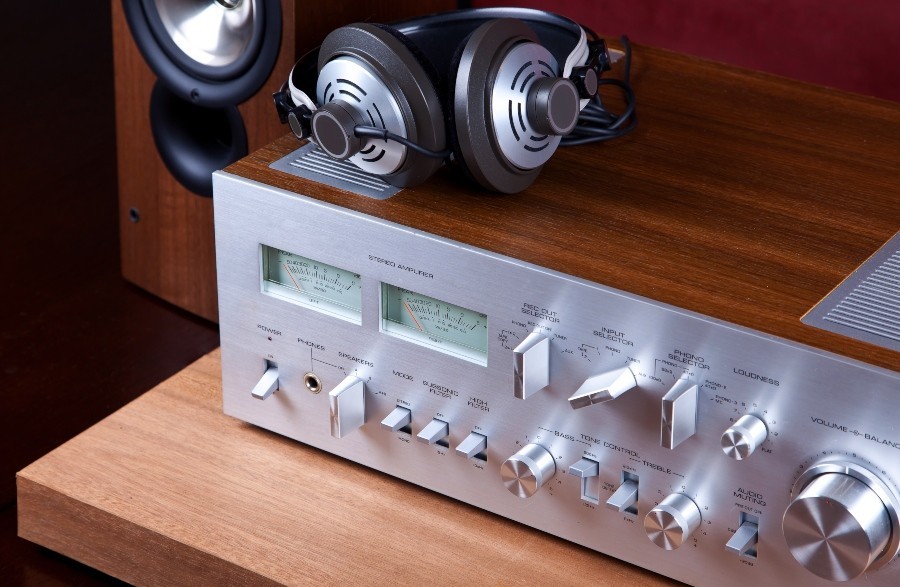 Analog integrated amplifier - headphones lie on it - Perfect sound in the living room