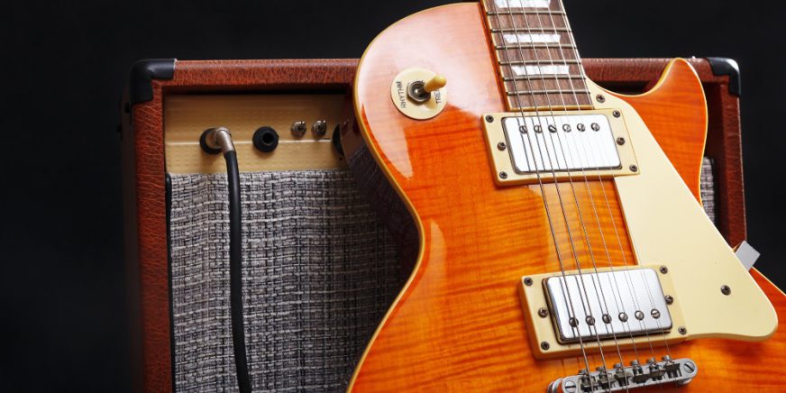 guitar-with-guitar-amp - Tube amp advantages
